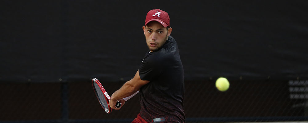 Mazen Osama hitting a tennis ball