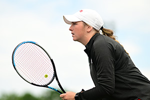 Anne Marie Hiser holding the racket